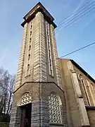 Photographie du clocher de l'église Saint-Antoine de Padoue à La Monnerie-le-Montel.