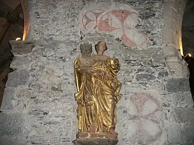 Sainte Barbe. Statue sculptée en bois et dorée (Environ  deux mètres de hauteur). Église Saint-Jean-Baptiste de Montréjeau