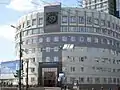Immeuble du tribunal d'arbitrage, à l'emplacement d'un ancien hôtel, rue Vorovski, 2 / persp. Lénine, 55.