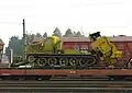 Creuseur de trous (MDK-2) sur un transport ferroviaire à Minsk