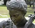 Statue de Jacqueline du Pré à Kensington&nbsp;(en), près de Sydney, Australie. Gros plan sur le visage