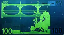 Billet de 100 euros sous lumière UV (Verso)