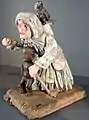 Statuette de sorcière (argile, début XXe&nbsp;siècle, collection Daniel Pouget, Le cabinet des curiosités, Chazelles-sur-Lavieu).
