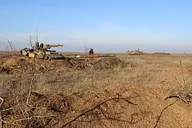 Deux T-64 en position de tir