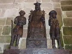 Groupe statuaire de saint Yves entre le riche et le pauvre (XVe siècle).