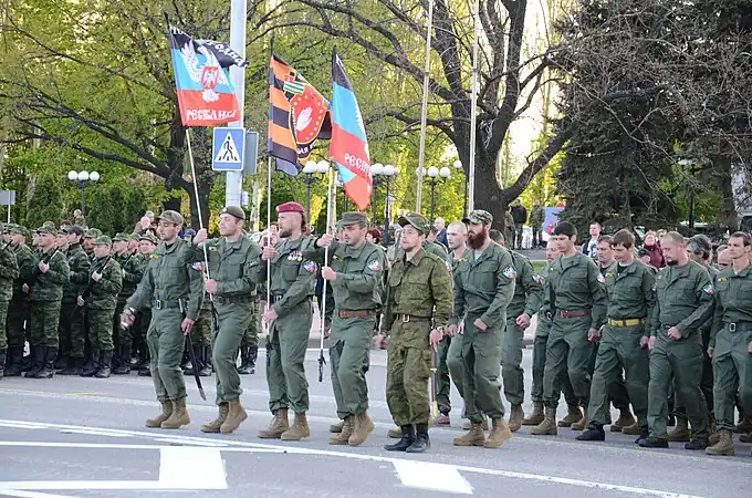 En 2015 avec le drapeau de l'unité
