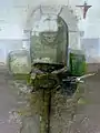 La fontaine intérieure du mur nord et ses deux bassins.