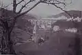 Train passant sur le viaduc ferroviaire de Port-Launay au début du XXe&nbsp;siècle