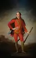 Portrait en pied d'un homme en uniforme rouge