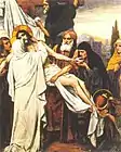 Marie accueille son Fils mort dans ses bras lors de la Descente de croix (Mt 27,57-59).