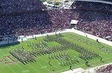Fanfare des Texas A&M exécutant le « aTm » de l'université