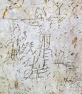 Suppedaneum figuré dans le graffiti d'Alexamenos (représentation de la crucifixion de Jésus entre le Ier&nbsp;siècle et le IIIe&nbsp;siècle) ?