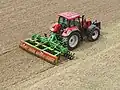 Amazone Catros 5001-2 dans les champs