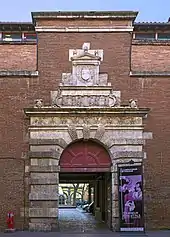 no 69 : la porte du collège de l'Esquile, par Nicolas Bachelier (1556).