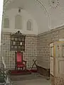 Pièces meublées du type de la fin du XIXe&nbsp;siècle avec fauteuil et paravent.