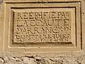 L'église, l'inscription de réédification.