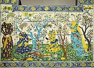Iran, Ispahan : Panneau de céramique à la joute poétique (XVIIe siècle).