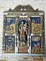 Le retable en bois.