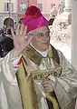 Gianni Ambrosio, le 16 février 2008, à l'entrée de sa[Quoi&nbsp;?] nouvelle cathédrale[Laquelle&nbsp;?].