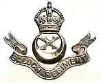 Insigne du 10e régiment baloutche avec la couronne Tudor.