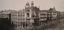 Photographie ancienne d'un boulevard pris en vue plongeante.