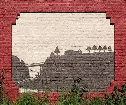 La ligne de chemin de fer qui part de la gare.