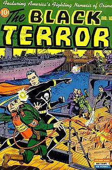 couverture en couleur d'un comics publié durant la seconde guerre mondiale : un héros masqué donne un coup de poing à un soldat nazi armé d'un lance-flammes. Le jeune compagnon du héros éteint les flammes en arrière-plan