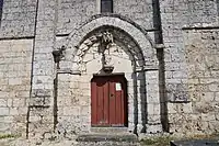 Portail latéral en tiers-point.