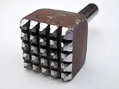 Boucharde issue d'une machine pneumatique.