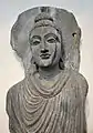 Grand Bouddha debout. Schiste. Gandhara. Fin du Ier&nbsp;siècle. Musées royaux d'art et d'histoire de Bruxelles, jubilee Park, Bruxelles.