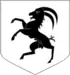 D'argent au bouquetin en pied de sable.