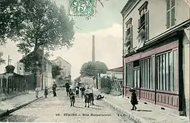 La rue Romaincourt, au début du XXe&nbsp;siècle.