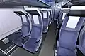 Salle à sièges inclinables.