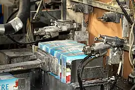 Mise en boîte.