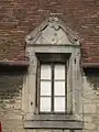 Lucarne avec amoiries