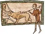 Une femme nue assise tien la corne d'une licorne pendant qu'un homme lui plante une lance dans le flanc