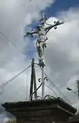 Croix Saint-Laurent, à l'angle de l'avenue Gambetta et de la rue Wenceslas-Coutellier.