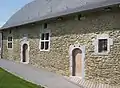Façade de l'ancienne Cour de Justice de Hosdent du XVIIe&nbsp;siècle, rénovée en 2007.