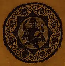 Aphrodite accroupie. Broderie en lin et laine. Égypte copte, IIIe – IVe&nbsp;siècle.