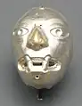Masque en platine de l'Équateur.