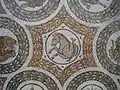 Détail de la mosaïque représentant des protomés d'animaux d'amphithéâtre.