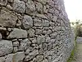 Muraille de la cité d'Eryx en Sicile avec réutilisation d'une base antérieure (IVe&nbsp;– IIIe&nbsp;siècles&nbsp;av. J.-C.).