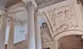 Escalier d'honneur à rampe en entrelacs ajourés et à quatre volées.