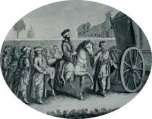 Cortège d’hommes enturbannés qui entourent un seul cavalier. Un carrosse les précède.