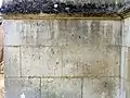 Graffiti sur le 3e&nbsp;contrefort du collatéral, côté est.