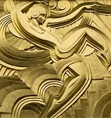 Danseuse style Art Deco géométrique, vue de profil un genou à terre, sujet et fond de courbes et angles à rendant, sont dorés à la feuille
