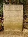 "Fonte das Lágrimas": tombe avec le verset de Camões.