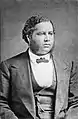Francis Lewis Cardozo&nbsp;(en), premier Afro-Américain secrétaire (1868-1872) et trésorier d'un État (1872-1877).