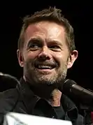 Garret Dillahunt interprète John Dorie Jr.