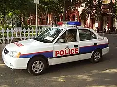 Patrouille de police à Madras (en).